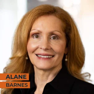 A woman with long red hair, smiling, wearing pearl earrings and a black top. The text "Alane Barnes" is displayed in bold orange letters at the bottom left.